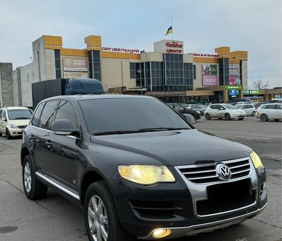Черный Фольксваген Туарег, объемом двигателя 3 л и пробегом 350 тыс. км за 6554 $, фото 1 на Automoto.ua