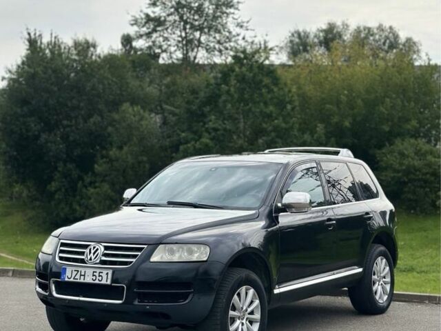 Черный Фольксваген Туарег, объемом двигателя 3 л и пробегом 281 тыс. км за 4999 $, фото 1 на Automoto.ua