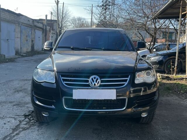 Чорний Фольксваген Туарег, об'ємом двигуна 3 л та пробігом 335 тис. км за 8499 $, фото 1 на Automoto.ua