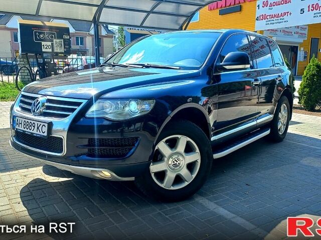 Чорний Фольксваген Туарег, об'ємом двигуна 3 л та пробігом 292 тис. км за 11500 $, фото 1 на Automoto.ua