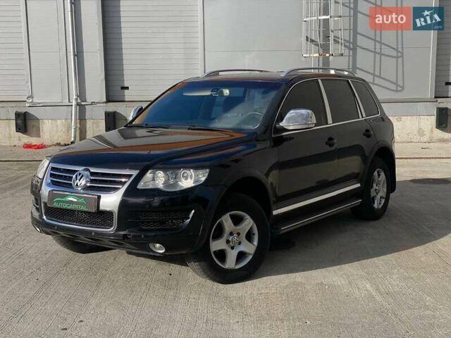 Черный Фольксваген Туарег, объемом двигателя 2.46 л и пробегом 296 тыс. км за 10290 $, фото 1 на Automoto.ua