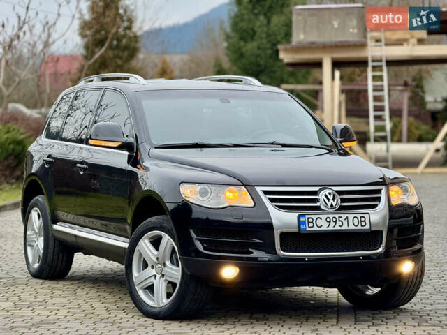 Черный Фольксваген Туарег, объемом двигателя 3 л и пробегом 280 тыс. км за 11700 $, фото 1 на Automoto.ua