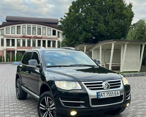 Черный Фольксваген Туарег, объемом двигателя 2.97 л и пробегом 235 тыс. км за 15200 $, фото 1 на Automoto.ua