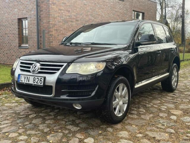 Черный Фольксваген Туарег, объемом двигателя 3 л и пробегом 379 тыс. км за 6630 $, фото 1 на Automoto.ua