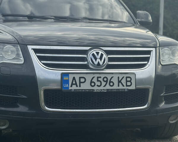 Черный Фольксваген Туарег, объемом двигателя 3 л и пробегом 255 тыс. км за 14500 $, фото 1 на Automoto.ua