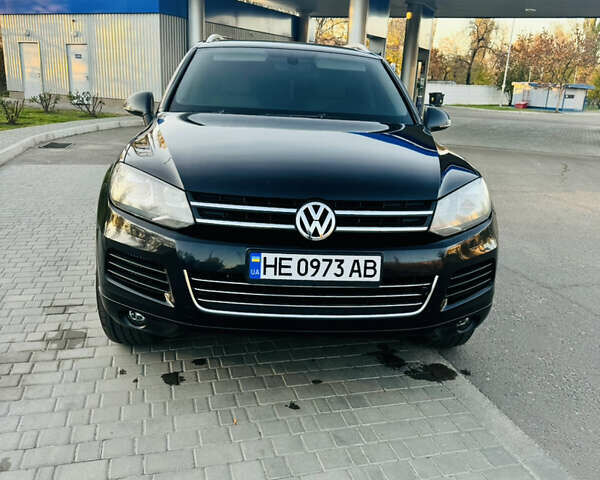 Черный Фольксваген Туарег, объемом двигателя 2.97 л и пробегом 400 тыс. км за 16000 $, фото 1 на Automoto.ua