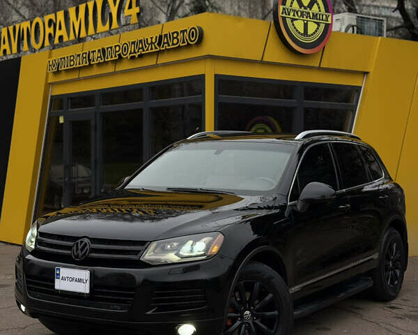 Черный Фольксваген Туарег, объемом двигателя 2.97 л и пробегом 301 тыс. км за 15300 $, фото 1 на Automoto.ua