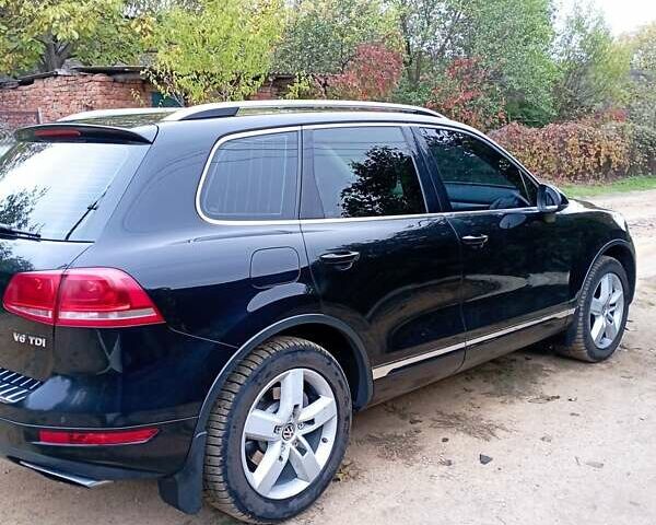 Черный Фольксваген Туарег, объемом двигателя 3 л и пробегом 338 тыс. км за 16200 $, фото 1 на Automoto.ua