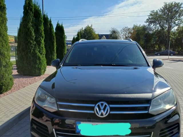 Черный Фольксваген Туарег, объемом двигателя 3 л и пробегом 240 тыс. км за 17500 $, фото 1 на Automoto.ua