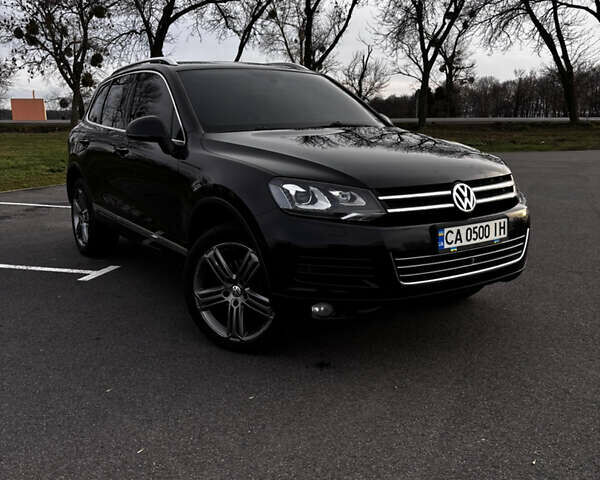 Чорний Фольксваген Туарег, об'ємом двигуна 2.97 л та пробігом 318 тис. км за 18500 $, фото 1 на Automoto.ua