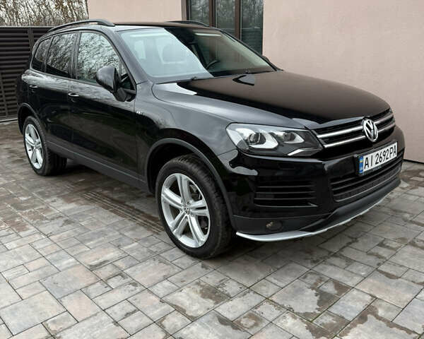 Черный Фольксваген Туарег, объемом двигателя 2.97 л и пробегом 236 тыс. км за 16700 $, фото 1 на Automoto.ua
