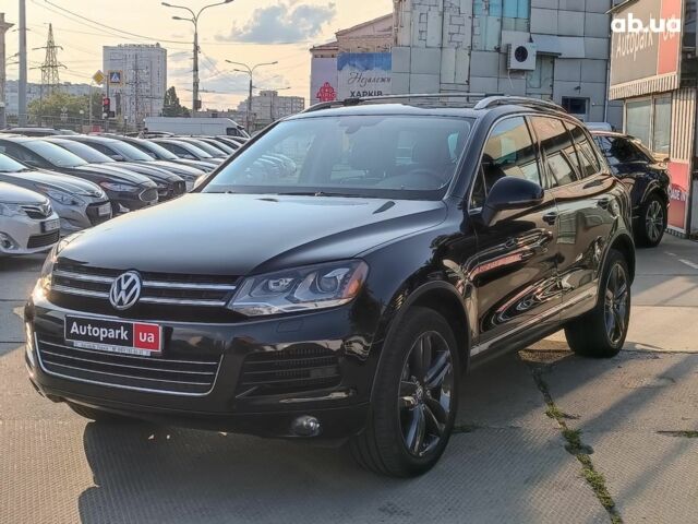 Черный Фольксваген Туарег, объемом двигателя 3 л и пробегом 207 тыс. км за 18990 $, фото 1 на Automoto.ua