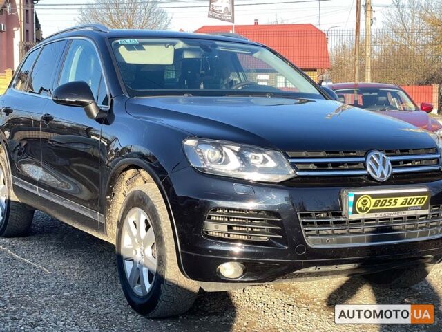 Черный Фольксваген Туарег, объемом двигателя 3 л и пробегом 235 тыс. км за 19999 $, фото 1 на Automoto.ua