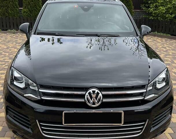 Черный Фольксваген Туарег, объемом двигателя 2.97 л и пробегом 281 тыс. км за 22500 $, фото 1 на Automoto.ua