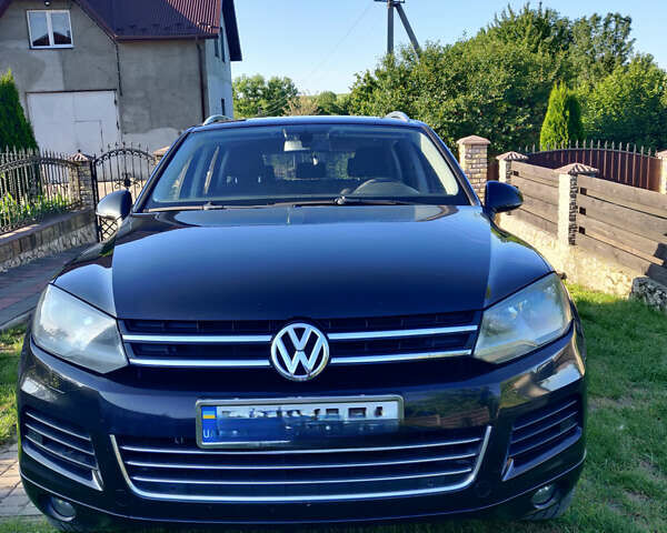 Черный Фольксваген Туарег, объемом двигателя 2.97 л и пробегом 214 тыс. км за 16600 $, фото 1 на Automoto.ua