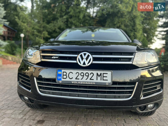 Черный Фольксваген Туарег, объемом двигателя 3 л и пробегом 310 тыс. км за 17500 $, фото 1 на Automoto.ua
