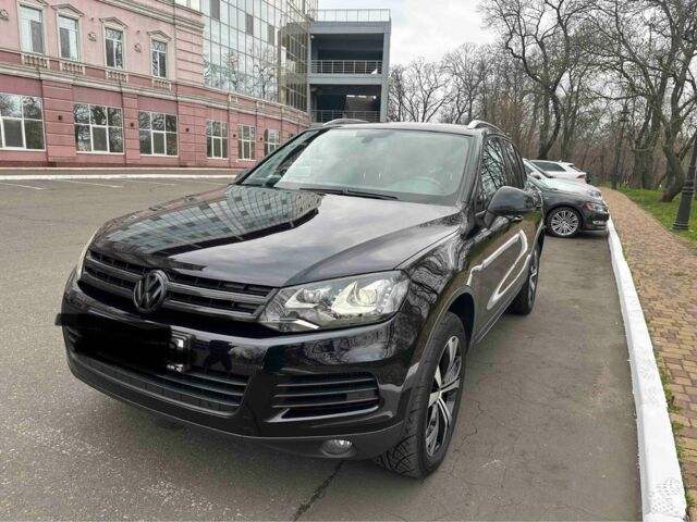 Черный Фольксваген Туарег, объемом двигателя 3 л и пробегом 310 тыс. км за 19500 $, фото 1 на Automoto.ua