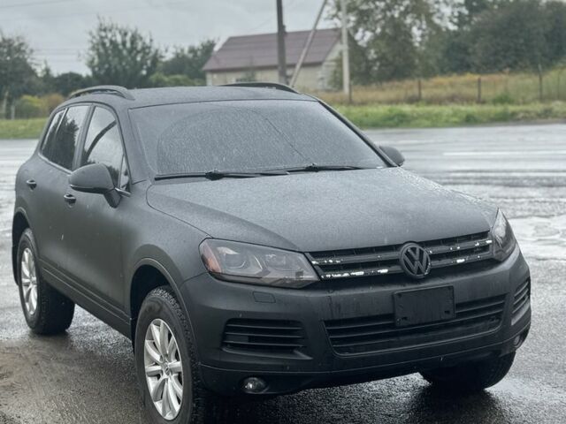 Чорний Фольксваген Туарег, об'ємом двигуна 3 л та пробігом 360 тис. км за 11562 $, фото 1 на Automoto.ua