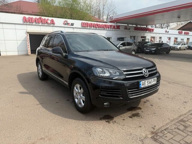 Черный Фольксваген Туарег, объемом двигателя 3 л и пробегом 330 тыс. км за 16200 $, фото 1 на Automoto.ua