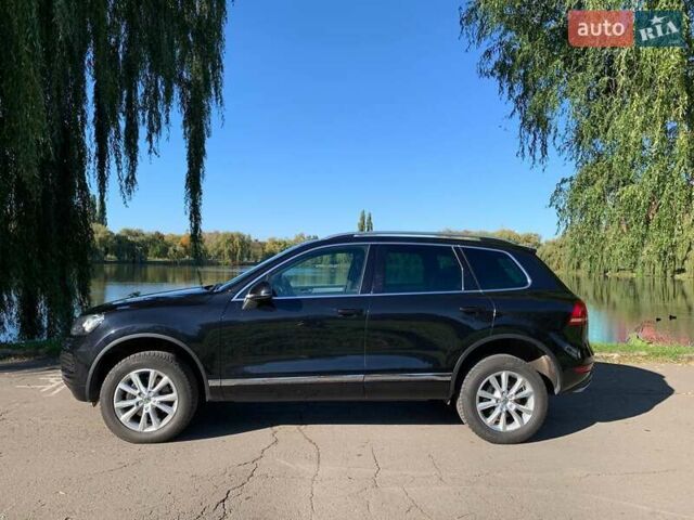 Черный Фольксваген Туарег, объемом двигателя 3 л и пробегом 279 тыс. км за 19000 $, фото 1 на Automoto.ua