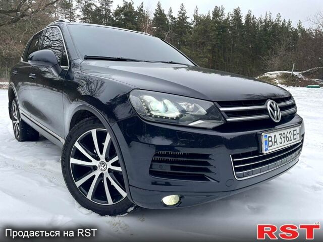 Черный Фольксваген Туарег, объемом двигателя 3 л и пробегом 258 тыс. км за 20600 $, фото 1 на Automoto.ua