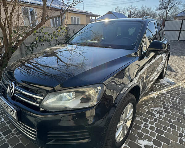Черный Фольксваген Туарег, объемом двигателя 2.97 л и пробегом 305 тыс. км за 16450 $, фото 1 на Automoto.ua