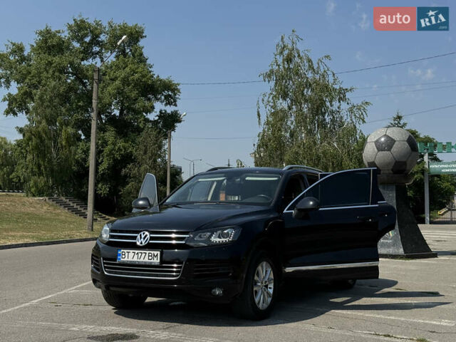 Черный Фольксваген Туарег, объемом двигателя 2.97 л и пробегом 160 тыс. км за 23500 $, фото 1 на Automoto.ua