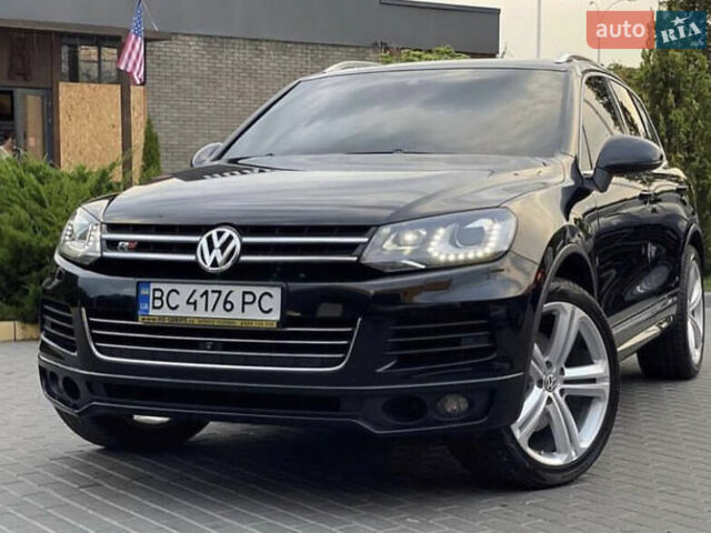 Чорний Фольксваген Туарег, об'ємом двигуна 4.13 л та пробігом 215 тис. км за 25000 $, фото 1 на Automoto.ua