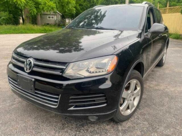 Чорний Фольксваген Туарег, об'ємом двигуна 3 л та пробігом 150 тис. км за 7000 $, фото 1 на Automoto.ua