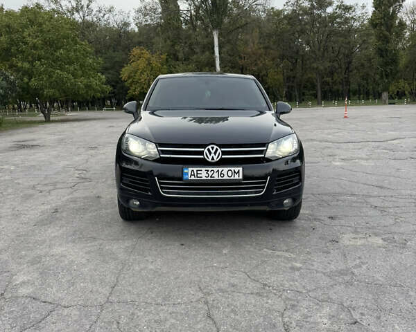 Черный Фольксваген Туарег, объемом двигателя 2.97 л и пробегом 160 тыс. км за 21000 $, фото 1 на Automoto.ua