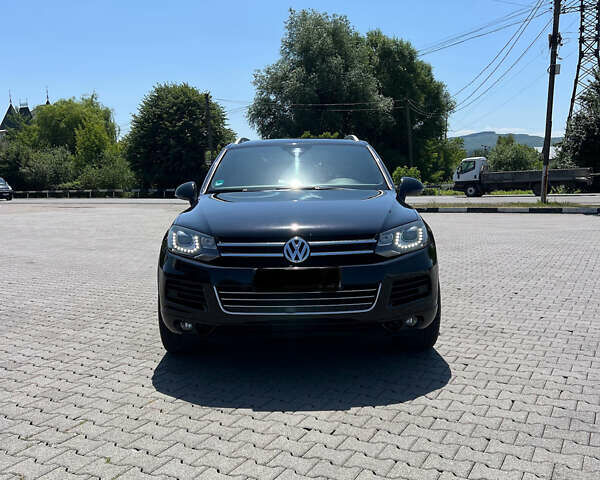 Чорний Фольксваген Туарег, об'ємом двигуна 2.97 л та пробігом 315 тис. км за 23000 $, фото 1 на Automoto.ua