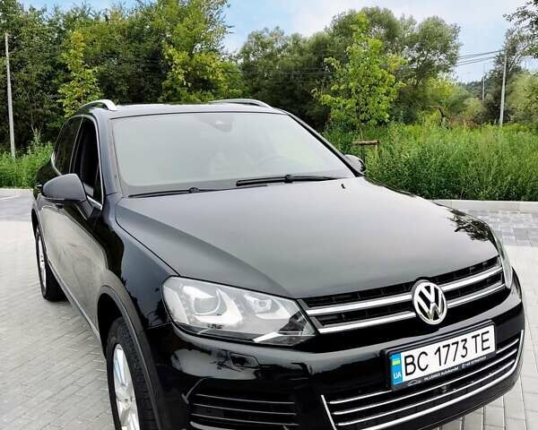 Черный Фольксваген Туарег, объемом двигателя 2.97 л и пробегом 148 тыс. км за 19500 $, фото 1 на Automoto.ua