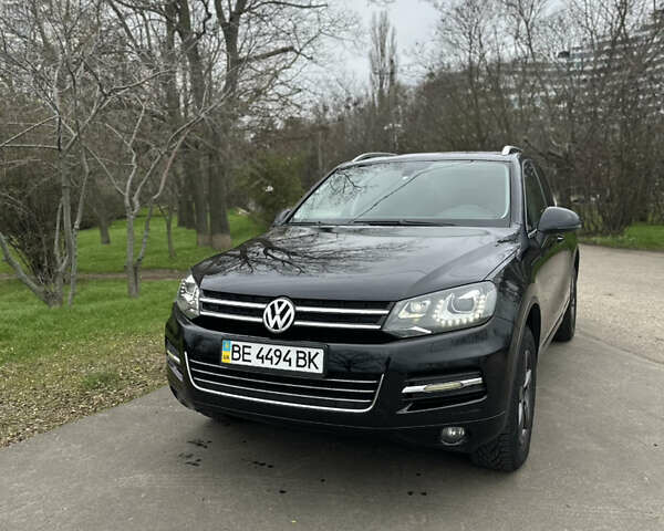 Черный Фольксваген Туарег, объемом двигателя 2.97 л и пробегом 220 тыс. км за 19500 $, фото 1 на Automoto.ua