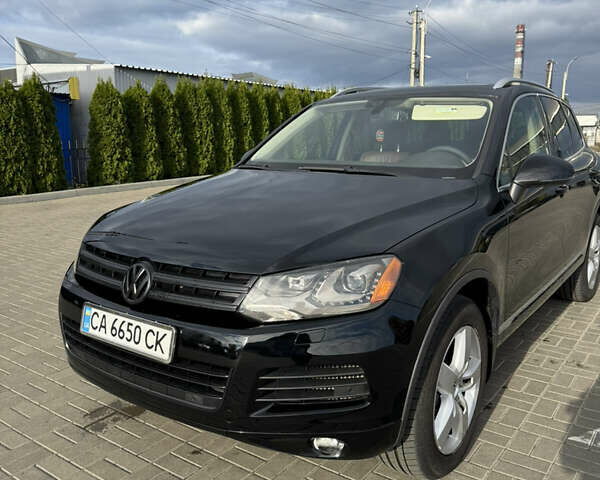 Чорний Фольксваген Туарег, об'ємом двигуна 2.97 л та пробігом 382 тис. км за 16700 $, фото 1 на Automoto.ua