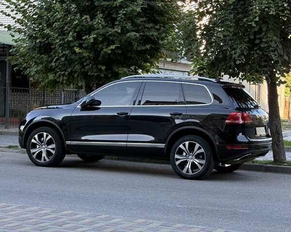 Чорний Фольксваген Туарег, об'ємом двигуна 3 л та пробігом 320 тис. км за 22500 $, фото 1 на Automoto.ua