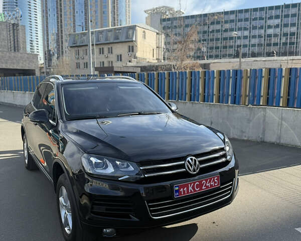 Чорний Фольксваген Туарег, об'ємом двигуна 2.97 л та пробігом 320 тис. км за 17700 $, фото 1 на Automoto.ua