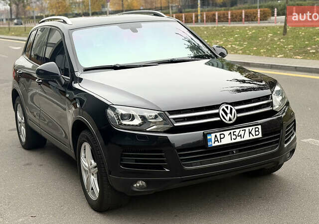 Черный Фольксваген Туарег, объемом двигателя 3 л и пробегом 220 тыс. км за 19700 $, фото 1 на Automoto.ua