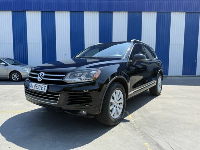 Черный Фольксваген Туарег, объемом двигателя 3 л и пробегом 315 тыс. км за 14850 $, фото 1 на Automoto.ua