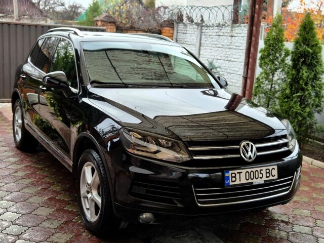 Черный Фольксваген Туарег, объемом двигателя 3 л и пробегом 250 тыс. км за 17300 $, фото 1 на Automoto.ua