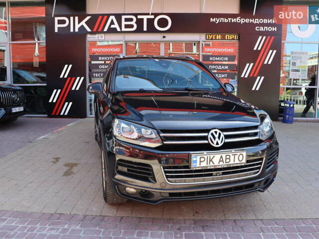 Черный Фольксваген Туарег, объемом двигателя 3 л и пробегом 142 тыс. км за 22900 $, фото 1 на Automoto.ua