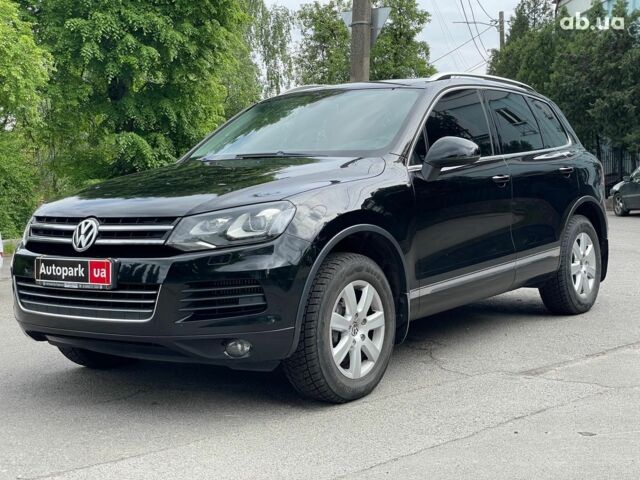 Чорний Фольксваген Туарег, об'ємом двигуна 3 л та пробігом 197 тис. км за 27490 $, фото 1 на Automoto.ua