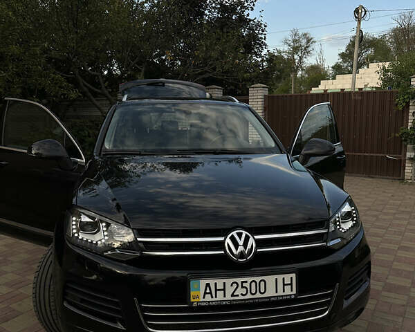 Черный Фольксваген Туарег, объемом двигателя 2.97 л и пробегом 342 тыс. км за 18000 $, фото 1 на Automoto.ua