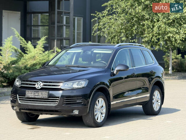 Черный Фольксваген Туарег, объемом двигателя 2.97 л и пробегом 240 тыс. км за 21500 $, фото 1 на Automoto.ua