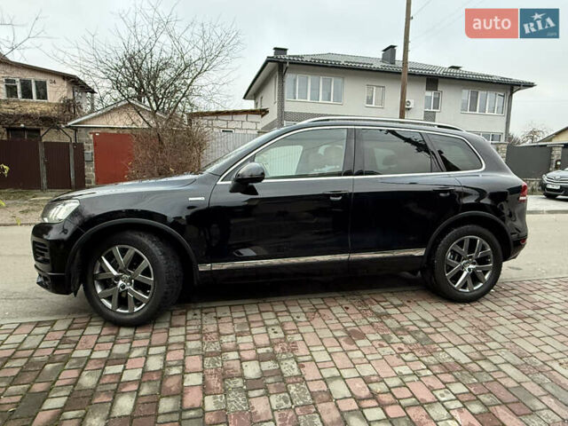 Чорний Фольксваген Туарег, об'ємом двигуна 4.13 л та пробігом 258 тис. км за 28500 $, фото 1 на Automoto.ua