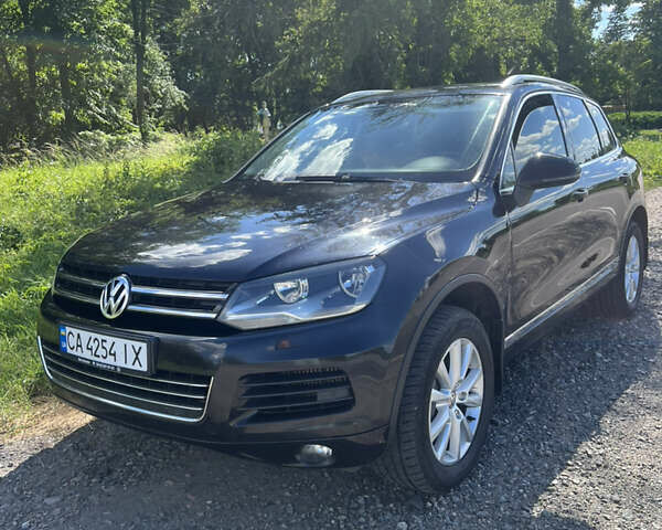 Черный Фольксваген Туарег, объемом двигателя 2.97 л и пробегом 295 тыс. км за 20000 $, фото 1 на Automoto.ua