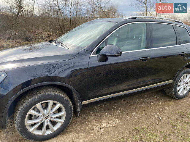 Чорний Фольксваген Туарег, об'ємом двигуна 3 л та пробігом 430 тис. км за 18500 $, фото 1 на Automoto.ua