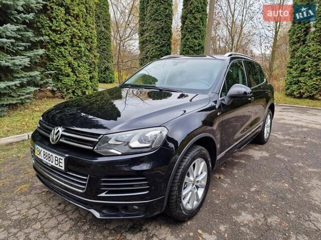 Черный Фольксваген Туарег, объемом двигателя 3 л и пробегом 209 тыс. км за 24999 $, фото 1 на Automoto.ua