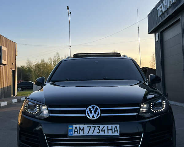 Черный Фольксваген Туарег, объемом двигателя 3 л и пробегом 270 тыс. км за 23200 $, фото 1 на Automoto.ua