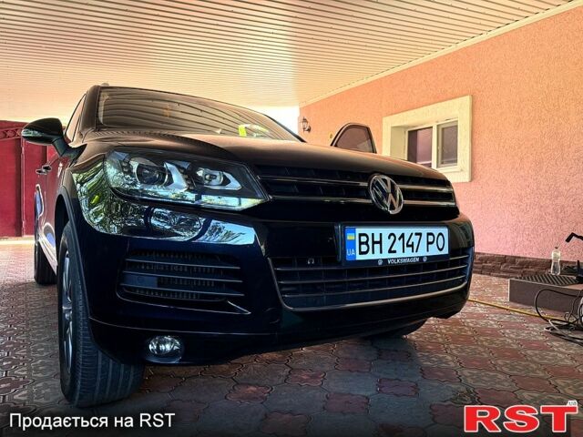 Черный Фольксваген Туарег, объемом двигателя 3 л и пробегом 199 тыс. км за 19800 $, фото 1 на Automoto.ua