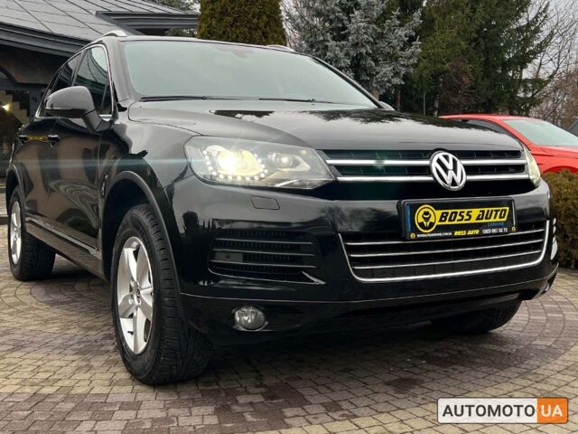 Чорний Фольксваген Туарег, об'ємом двигуна 3 л та пробігом 191 тис. км за 25300 $, фото 1 на Automoto.ua